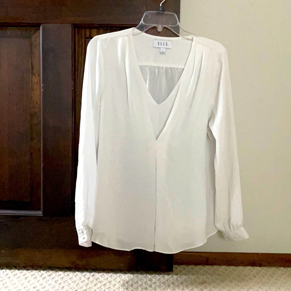 White flowing blouse